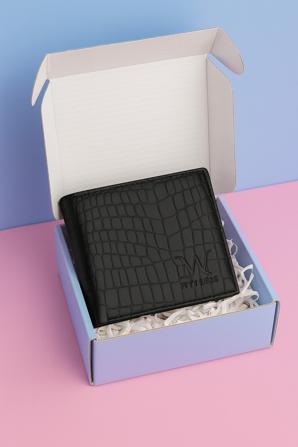 Black textured leather wallet open in gift box