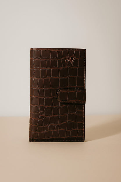 Croc-embossed leather travel clutch detail