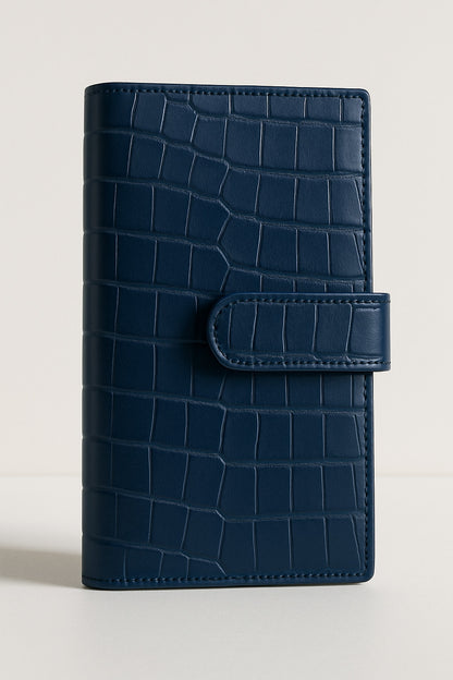 Croc-embossed leather travel clutch detail