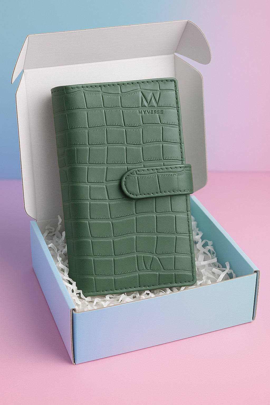 Sage green croc-embossed leather travel clutch in gift box